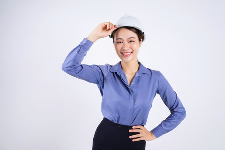 Photo of young Asian businesswoman on white backgroundの写真素材
