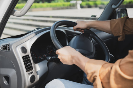 Photo of young Asian man with his truckの写真素材