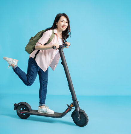 Photo of young Asian woman on backgroundの写真素材