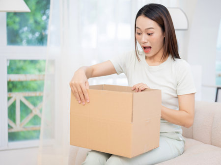Young Asian open carton box