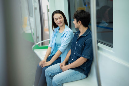 Photo of young Asian couple hang out togetherの写真素材