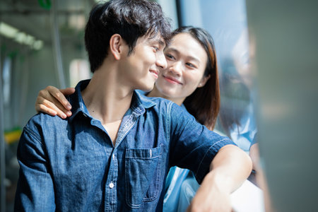 Photo of young Asian couple hang out togetherの写真素材