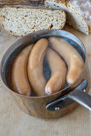 Frankfurt sausages in hot water and breadの写真素材