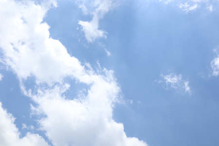 clear blue sky with white cloudsの写真素材