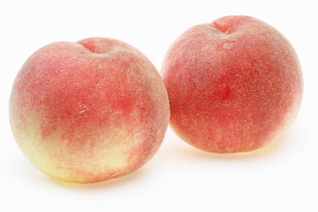 Peaches in a white backgroundの写真素材