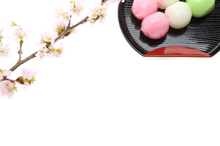 Japanese dumpling with cherry blossomの写真素材