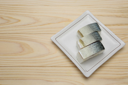 Mackerel sushi on a plateの写真素材