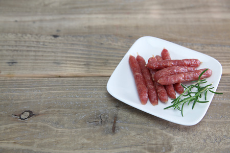 Salami on a plateの写真素材
