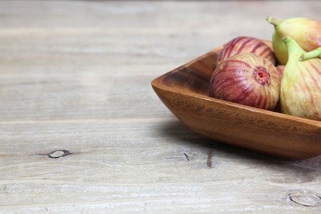 Figs in a wooden plate