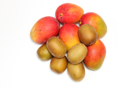 Kiwi fruit and mango in a white backgroundの写真素材