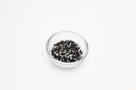 Sesame and salt in a glass bowl
