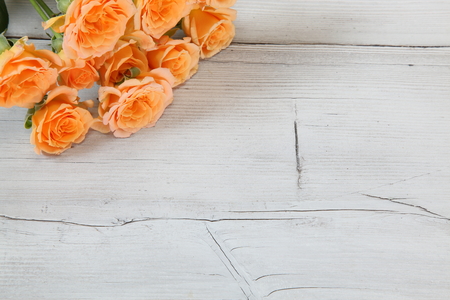 bouquet of roses in a wooden backgroundの写真素材