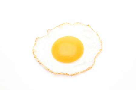 fried egg in a white backgroundの写真素材