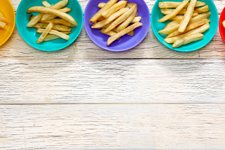 French fries on the plastic plate