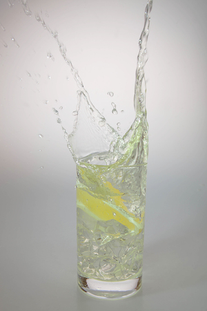 water splashing in the glassの写真素材