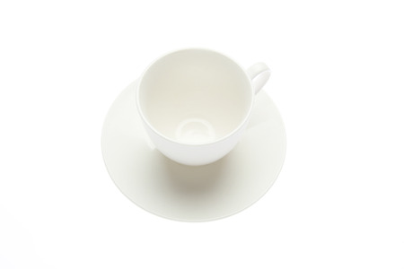 empty coffee cup and saucer in a white background