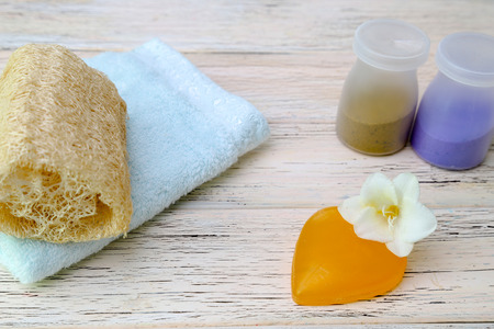 heart shaped soap in a wooden backgroundの写真素材