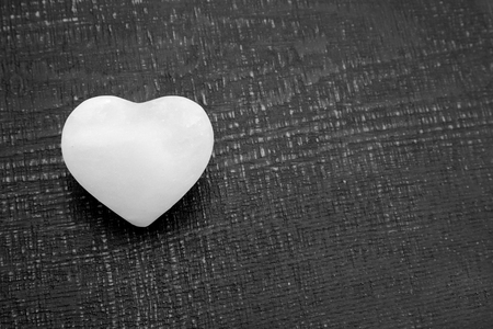 Black and white photography of heart shaped rock salt.の写真素材