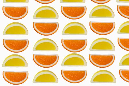 cut orange and lemon in a white backgroundの写真素材