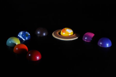 various kind of planet shaped chocolatesの写真素材