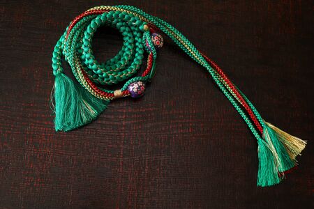 japanese orphrey for kimono on the lacquered boardの写真素材