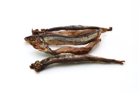 roasted shishamo fish in a white backgroundの写真素材