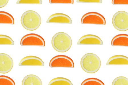 cut orange and lemon in a white backgroundの写真素材