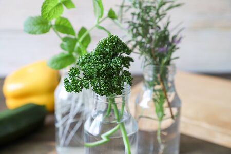 herbs in a wooden back groundの写真素材
