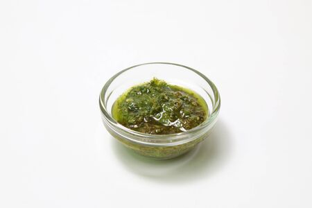 basil paste in the glass bowlの写真素材
