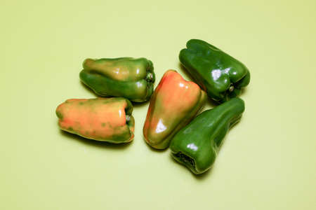 sweet peppers in a green background