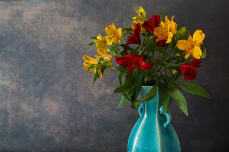 bouquet of alstroemeria in the blue vaseの写真素材