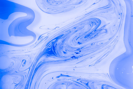 the pattern created by ink in waterの写真素材