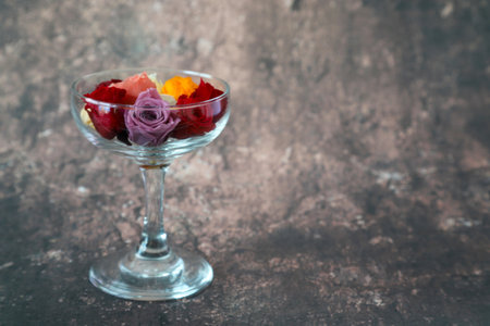 flower head of roses and cocktai glassの写真素材