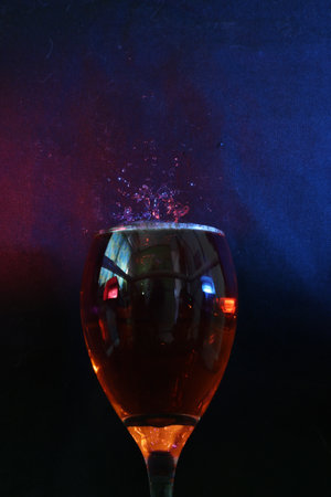color liquid splashing in the glassの写真素材