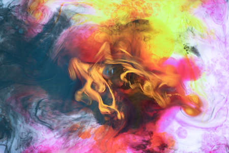 the pattern created by ink in waterの写真素材