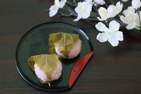 rice cake with bean paste wrapped in a preserved cherry leafの写真素材