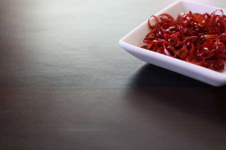 dried chili cutting in round slicesの写真素材