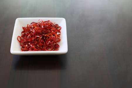 dried chili cutting in round slicesの写真素材
