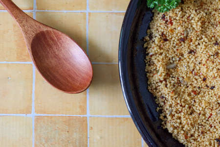 couscous on the black dishの写真素材