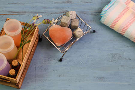 heart shaped rock solt in a wooden backgroundの写真素材