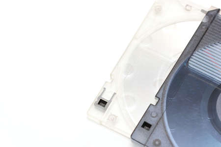 Outdated magneto-optical disk isolated on a white background.