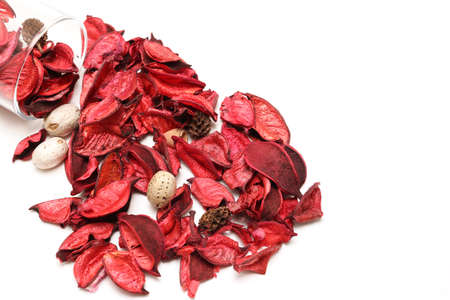 Potpourri in a glass isolated on a white background.の写真素材