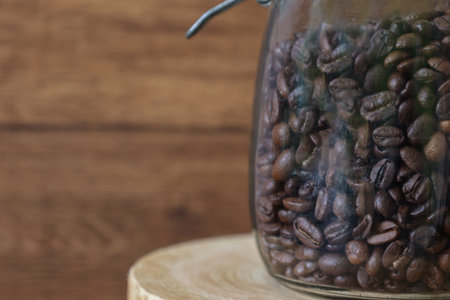 Coffee beans preserved in a glass bottle.の写真素材
