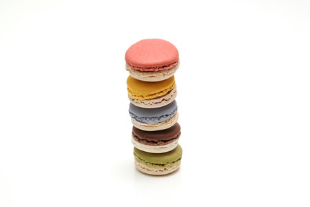 Various colored macaroons isolated on a white background.の写真素材