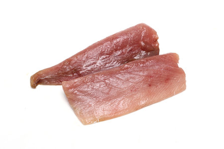 Fillet of Yellowtail isolated on a white background.の写真素材