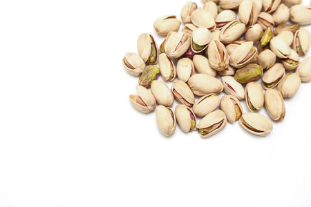 Pistachios isolated on a white background.の写真素材