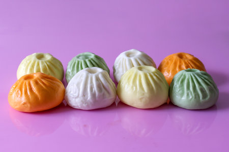 Chinese steamed buns isolated on a pink background.の写真素材