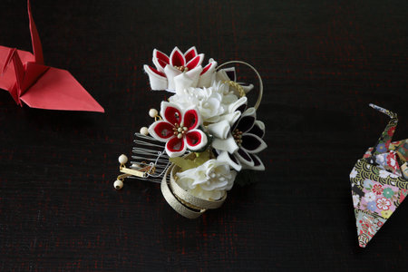 Pictured japanese decorative hair pin on the lacquered board.の写真素材