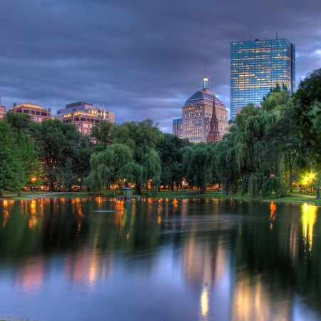 View across the Public Garden pond towards the Hancock Towers at Sunsetの写真素材