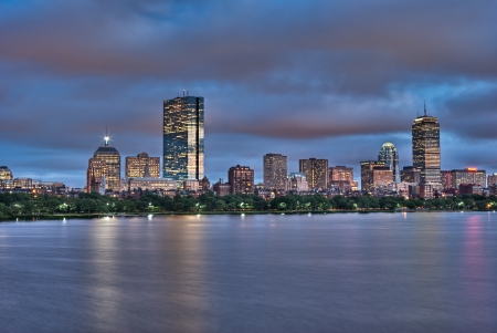 Night view of the Boston Skyline with brightly illuminated buildingsの写真素材